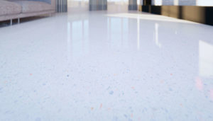 Empty room depicting a clean and new condition terrazzo floor with a shiny reflection in perspective view